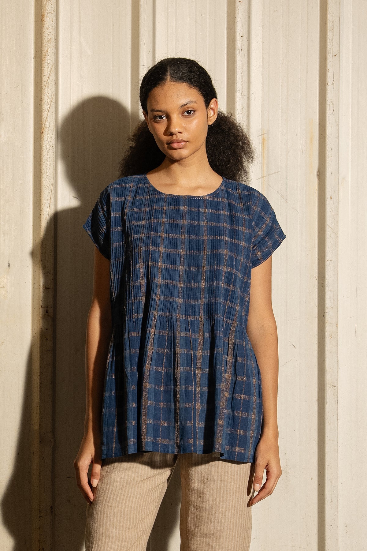DVE Divya pintucked top in checked handloom indigo check cotton with lurex stripe.
