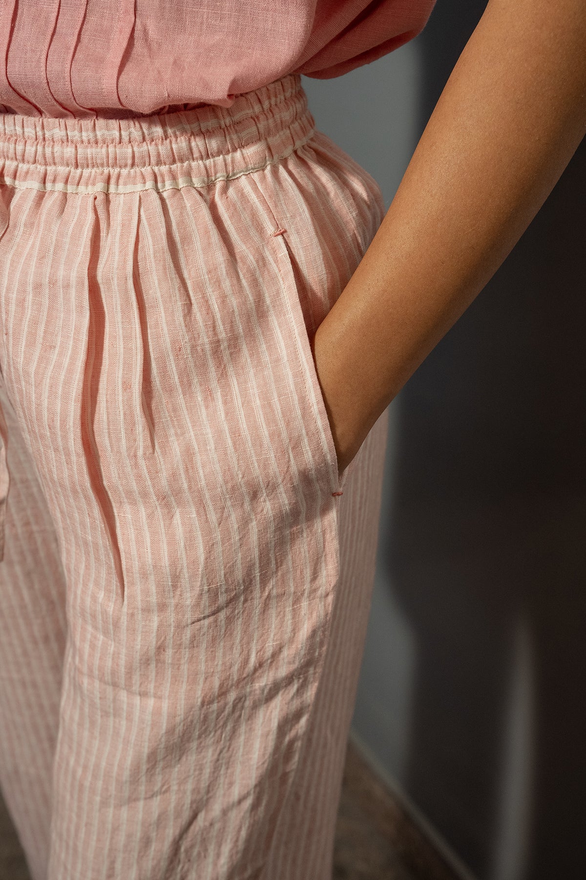 DVE Bala linen drawstring elastic waist straight leg pants in rose pink and white handloom.