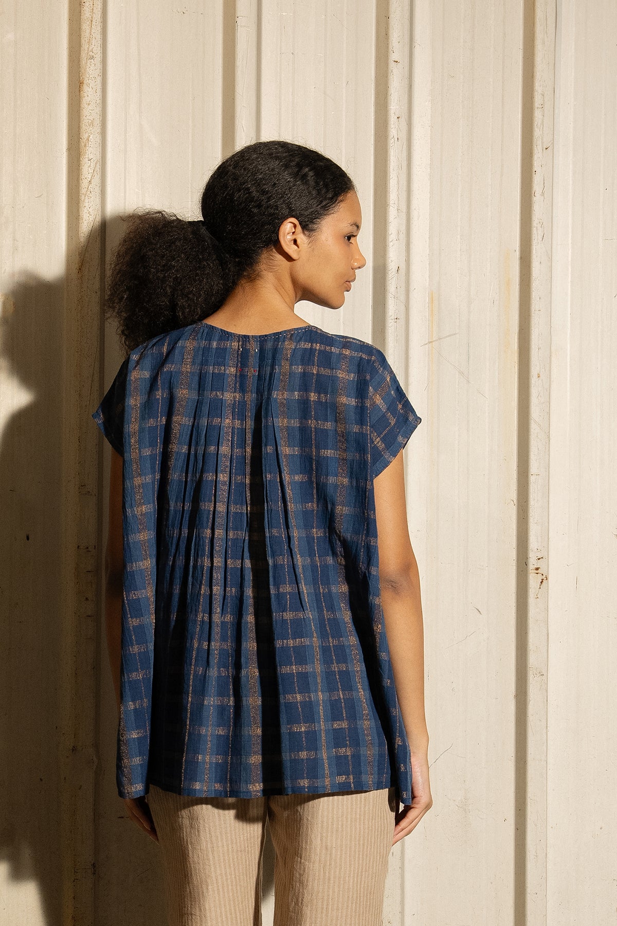 DVE Divya pintucked top in checked handloom indigo check cotton with lurex stripe.