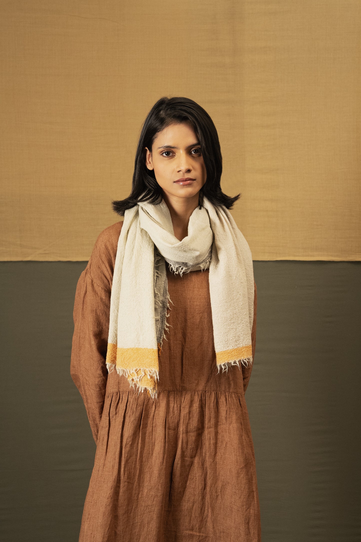 DVE Fine wool scarf in oyster grey, cream with mustard border.