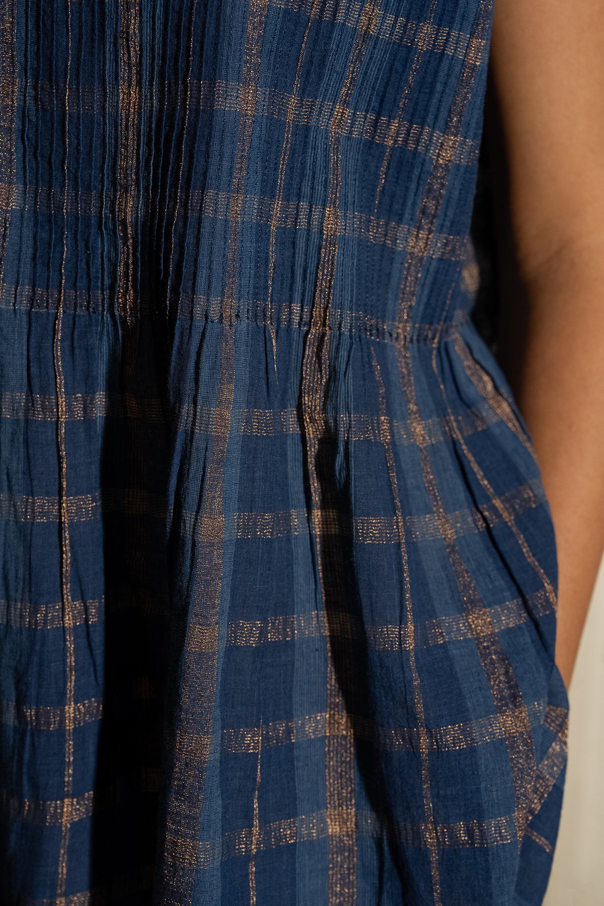 DVE Divya pintucked top in checked handloom indigo check cotton with lurex stripe.