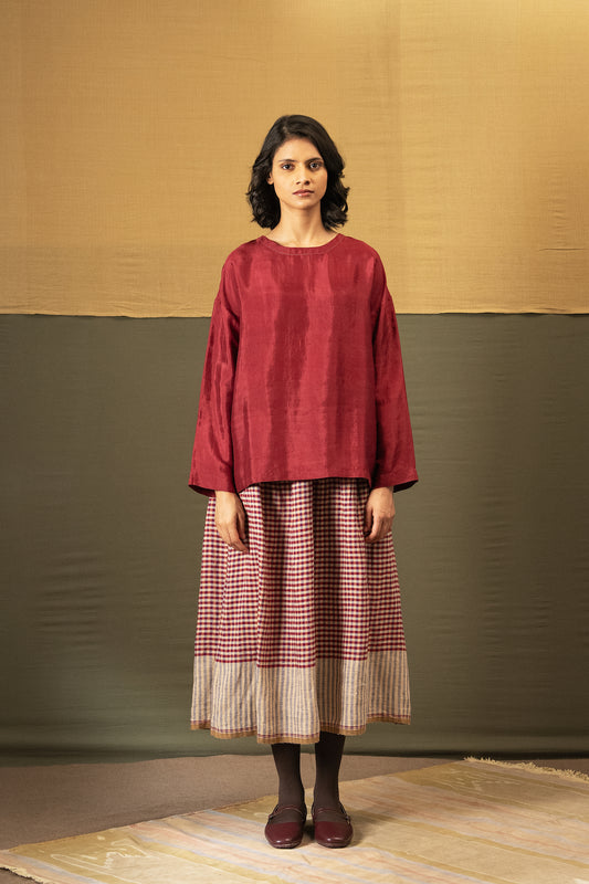 DVE Isha drawstring skirt in barn red linen gingham check with selvedge detail.