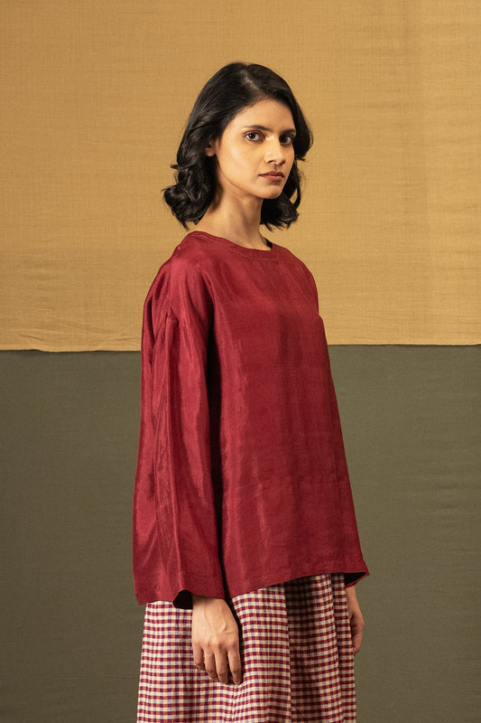 DVE Santati long sleeve round neck top in barn red handloom silk.