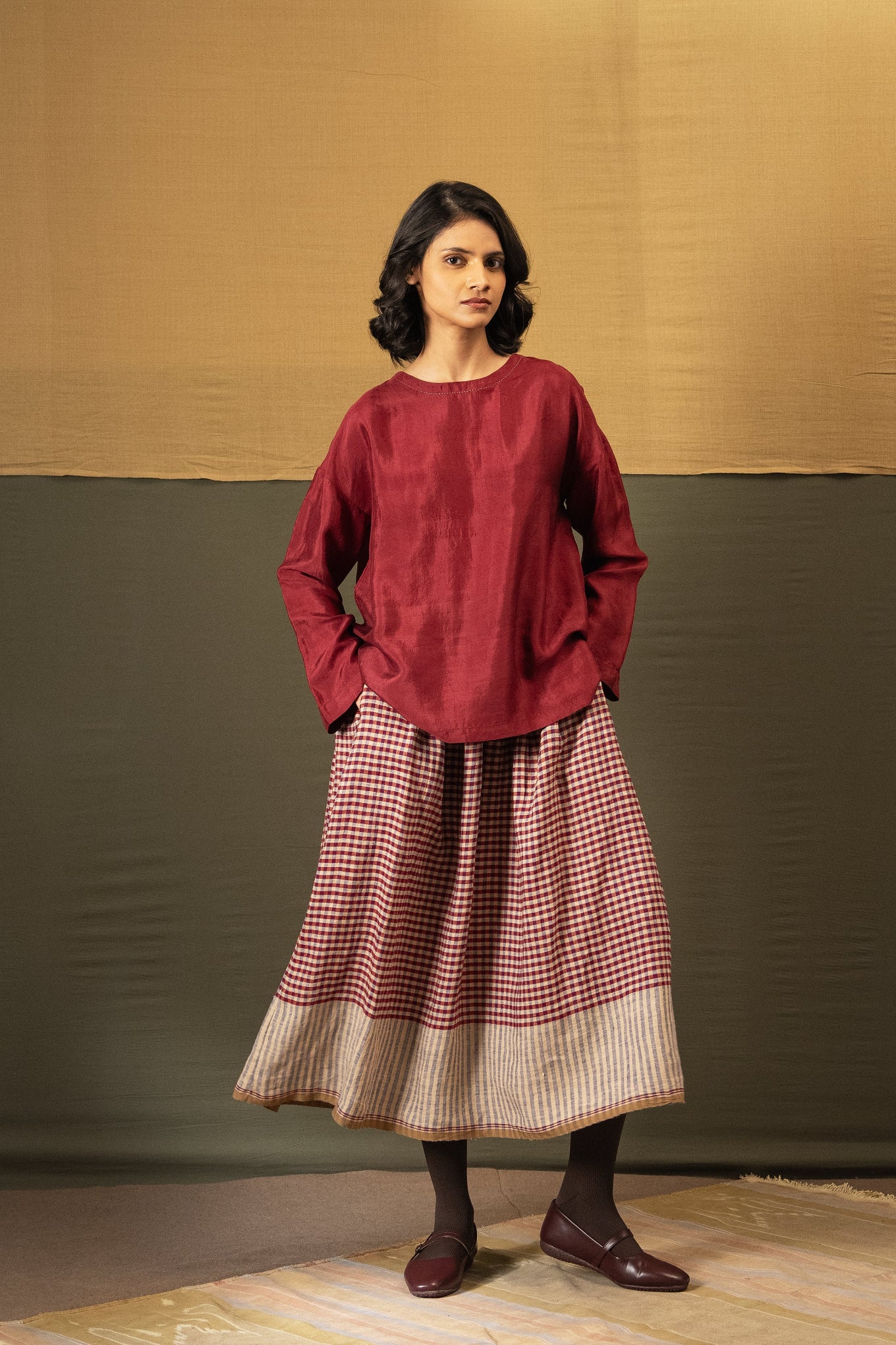 DVE Santati long sleeve round neck top in barn red handloom silk.