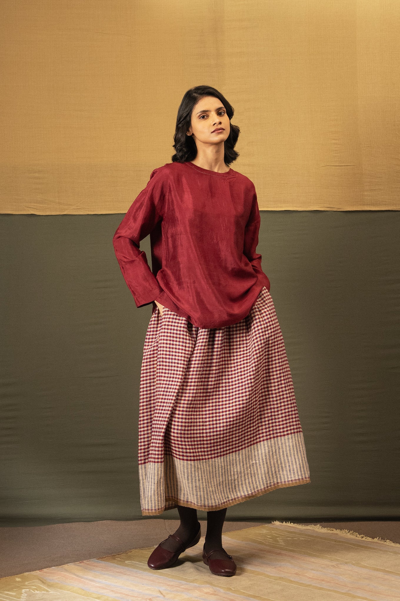 DVE Santati long sleeve round neck top in barn red handloom silk.