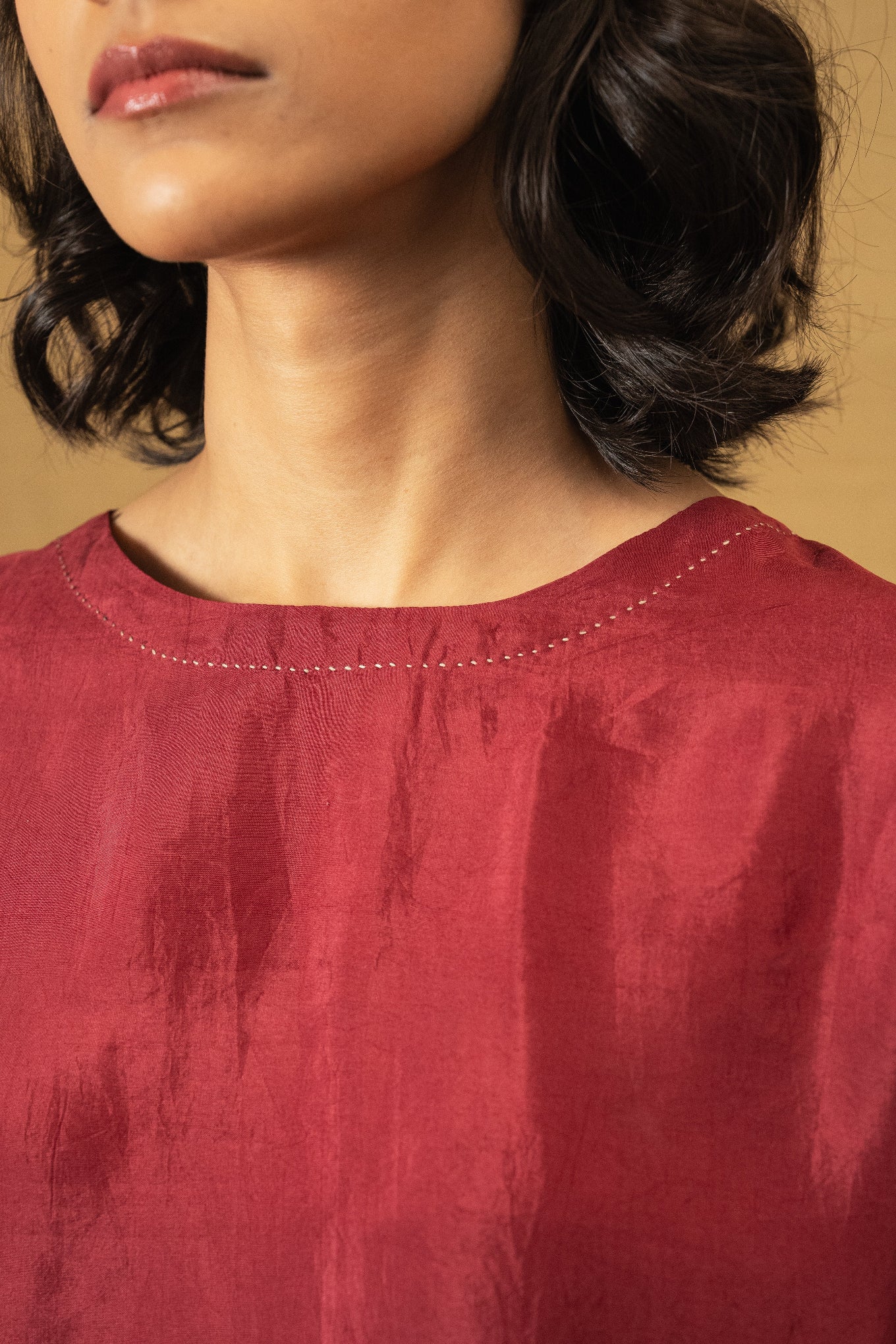 DVE Santati long sleeve round neck top in barn red handloom silk.
