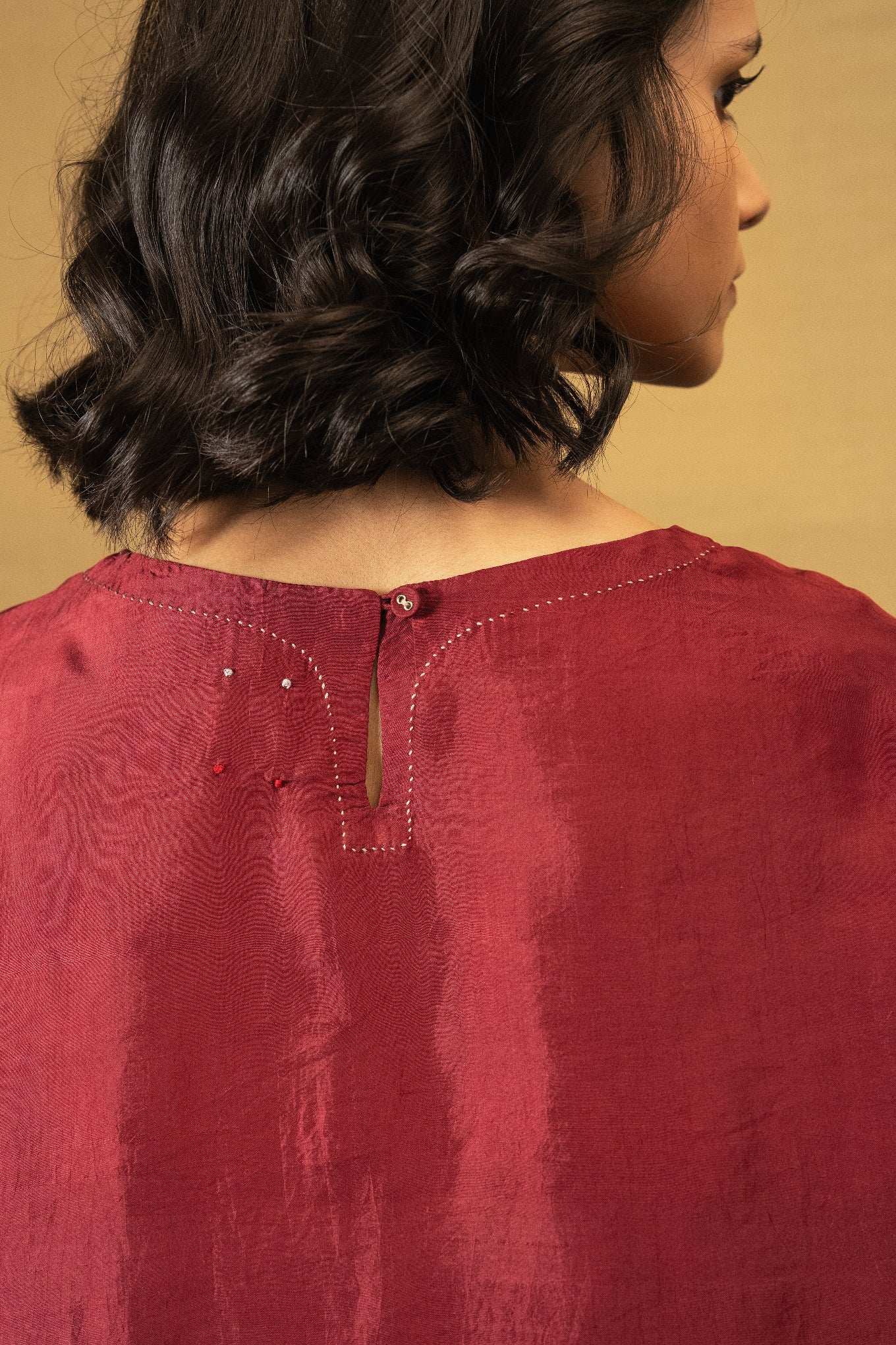 DVE Santati long sleeve round neck top in barn red handloom silk.