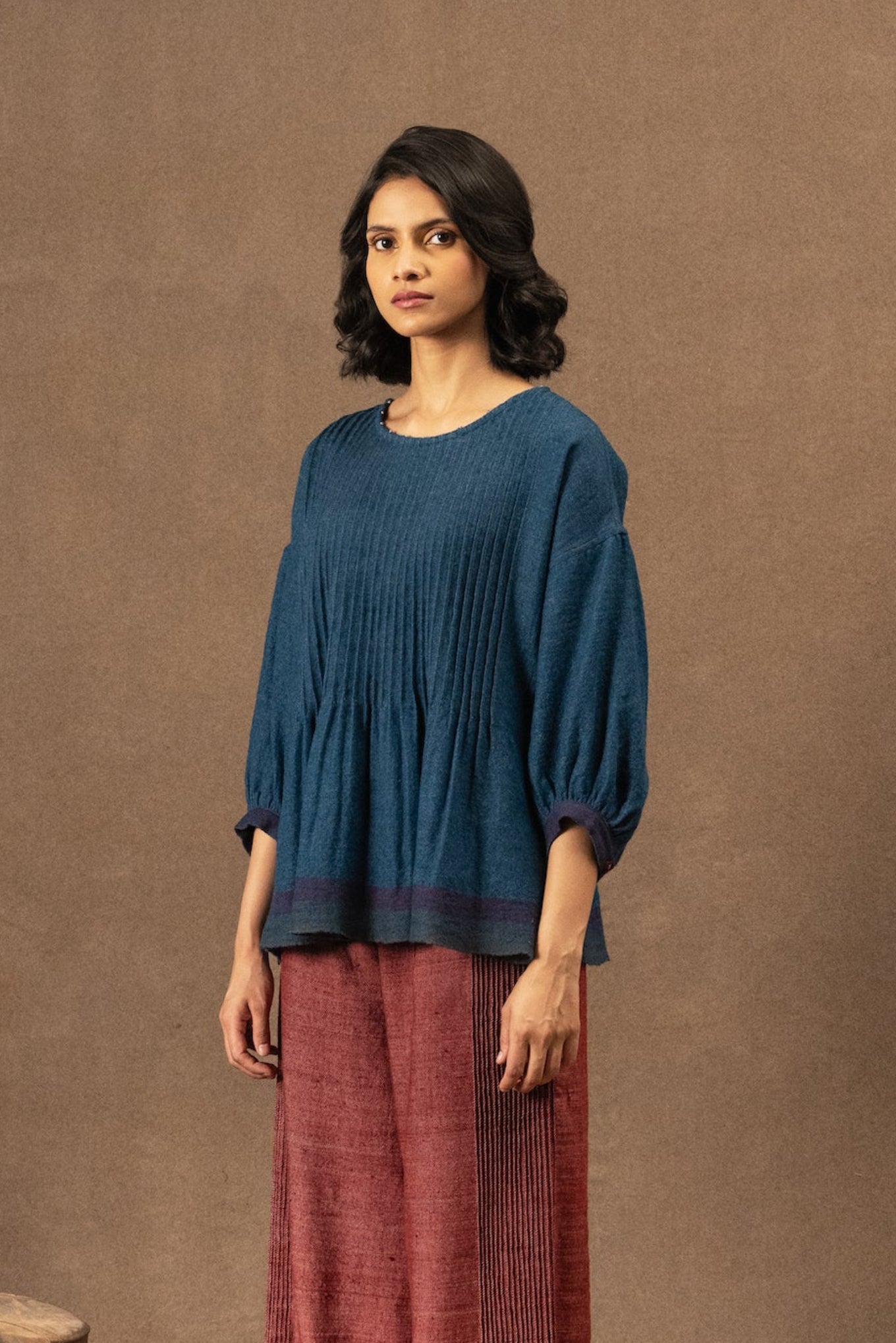 DVE Anisha pintuck top in soft wool in indigo blue.