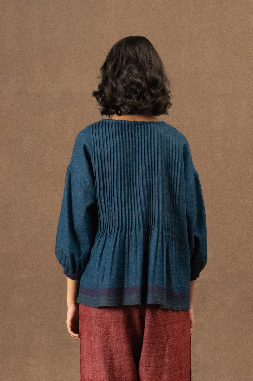 DVE Anisha pintuck top in soft wool in indigo blue.