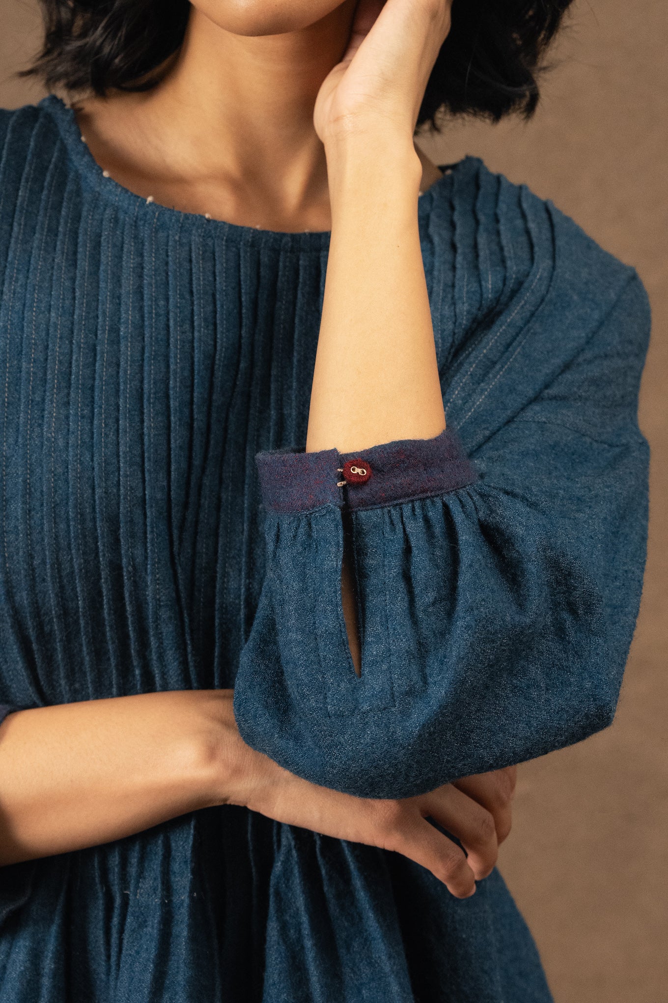 DVE Anisha pintuck top in soft wool in indigo blue.