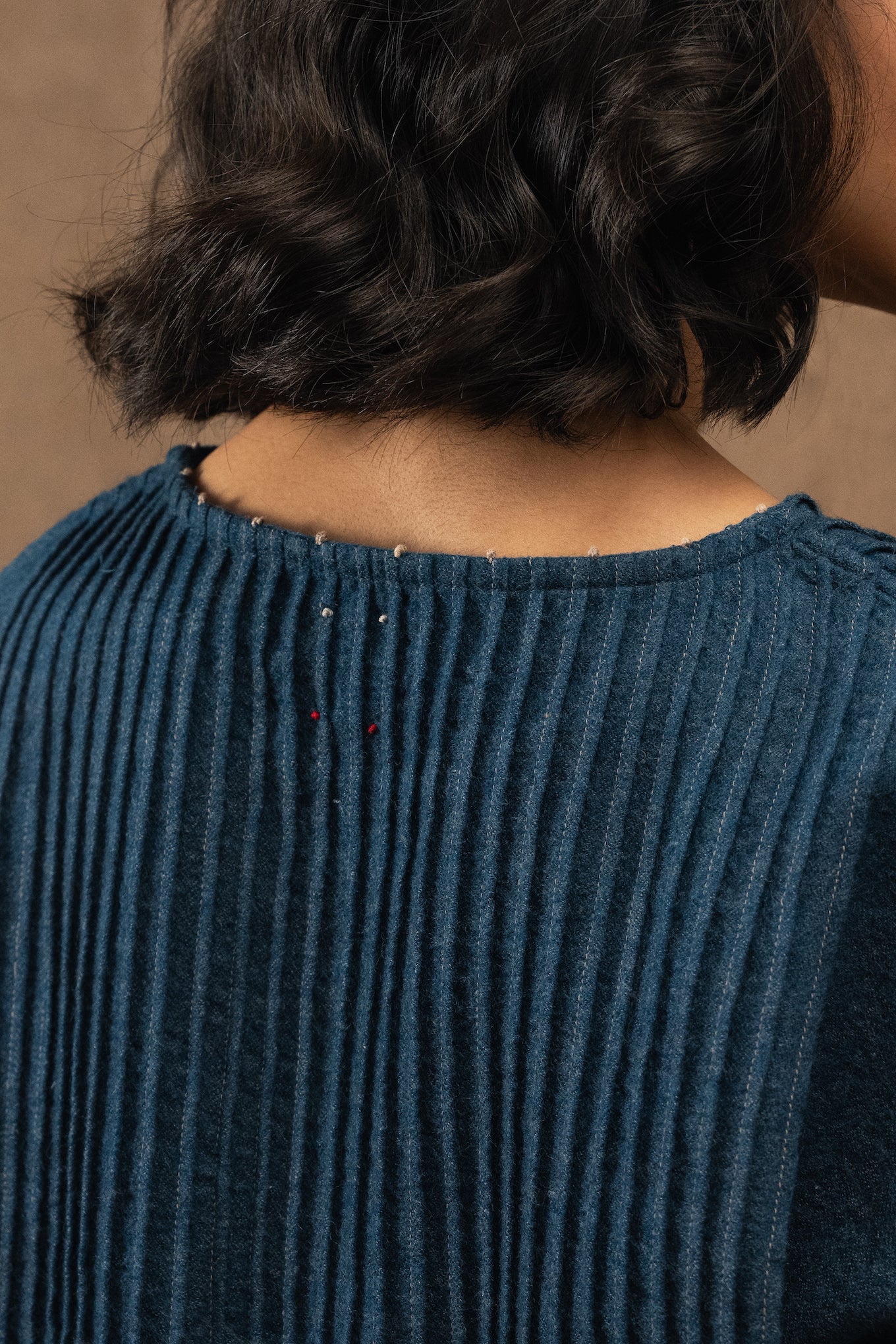 DVE Anisha pintuck top in soft wool in indigo blue.