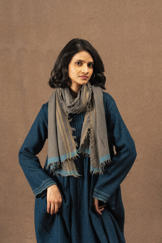 DVE Fine wool scarf in gunmetal grey with mustard and blue selvedge.
