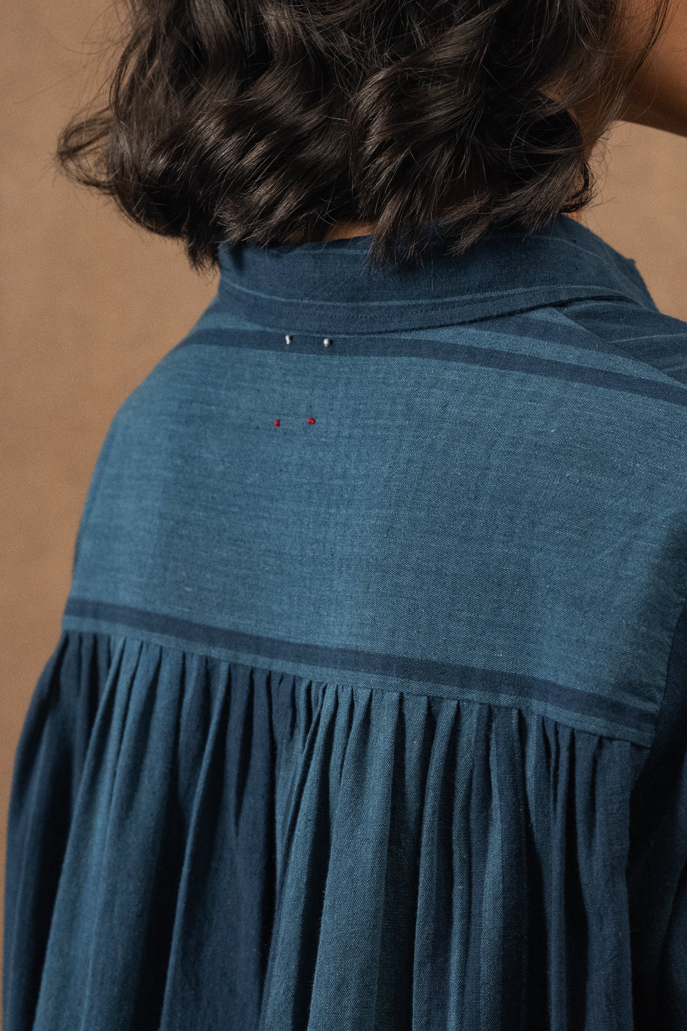 DVE Deveshi pure cotton long sleeve blouse in natural indigo blue stripe.