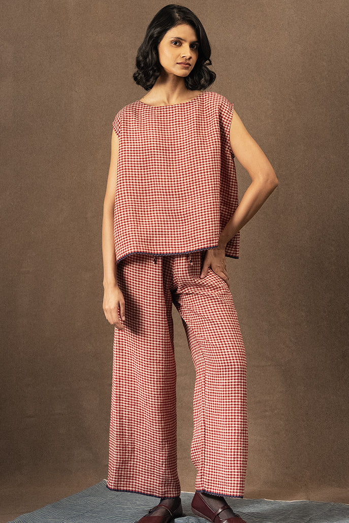 DVE Dityaa linen pants in crimson check.