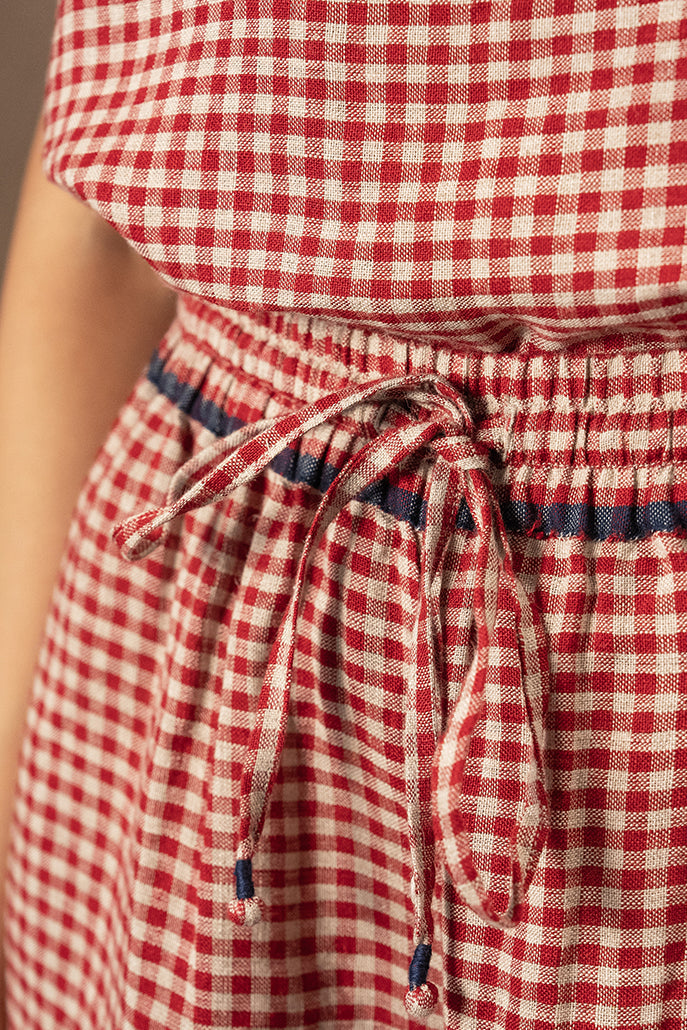 DVE Dityaa linen pants in crimson check.