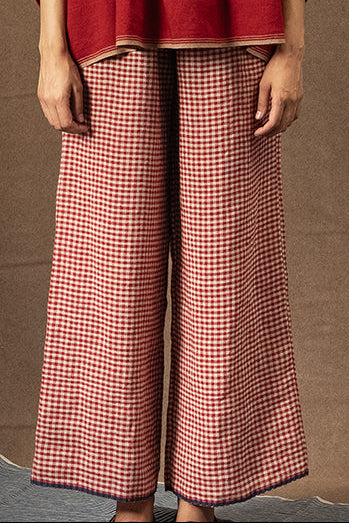 DVE Dityaa linen pants in crimson check.