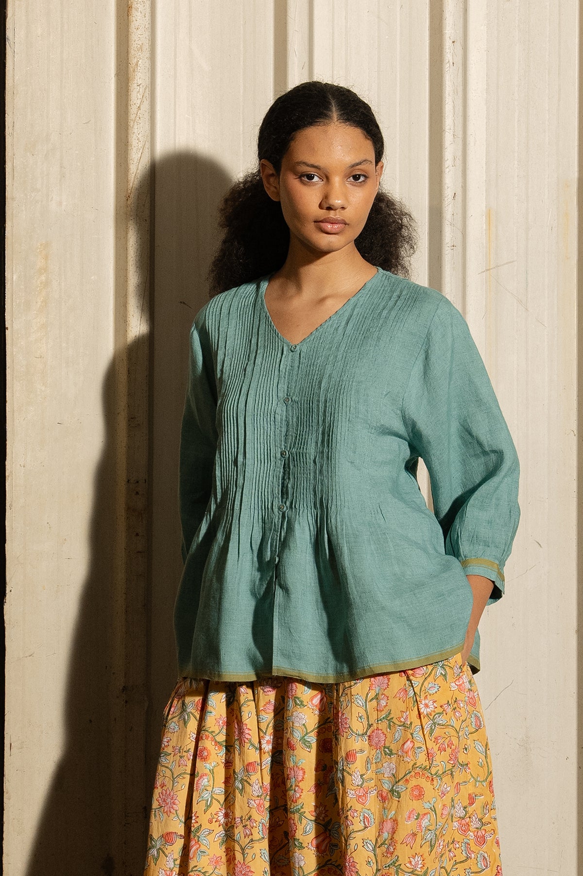 Dve Soma handloom linen pintuck 3/4 sleeve blouse in mineral green.