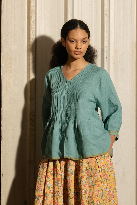 Dve Soma handloom linen pintuck 3/4 sleeve blouse in mineral green.