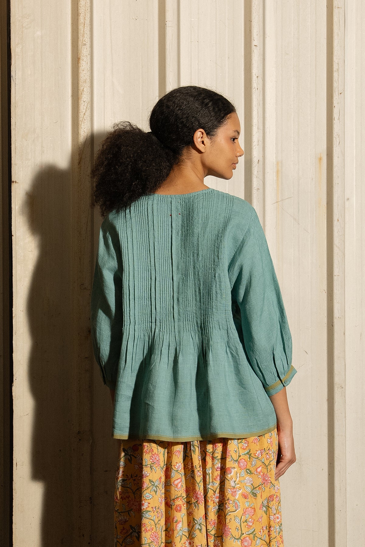 Dve Soma handloom linen pintuck 3/4 sleeve blouse in mineral green.