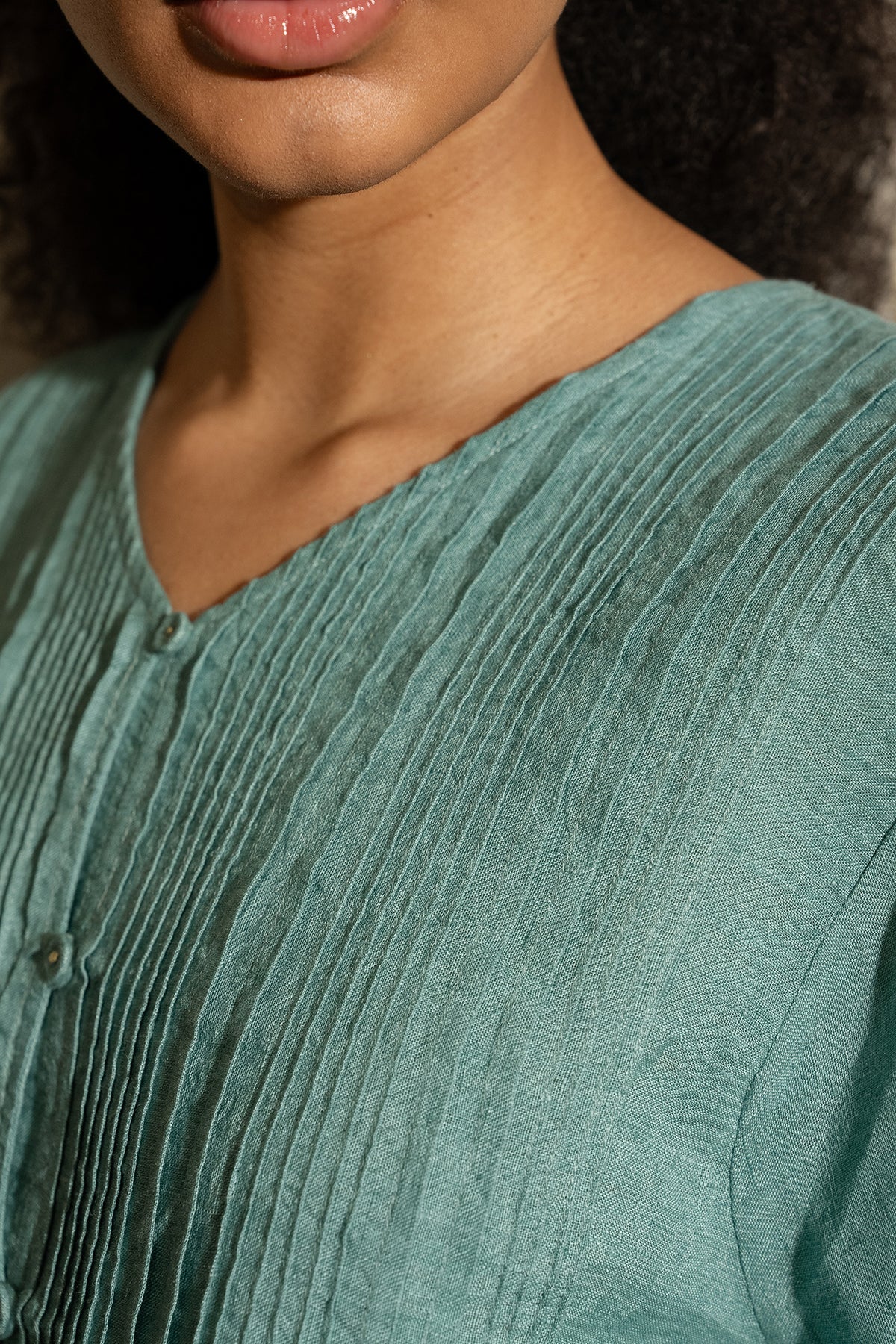 Dve Soma handloom linen pintuck 3/4 sleeve blouse in mineral green.