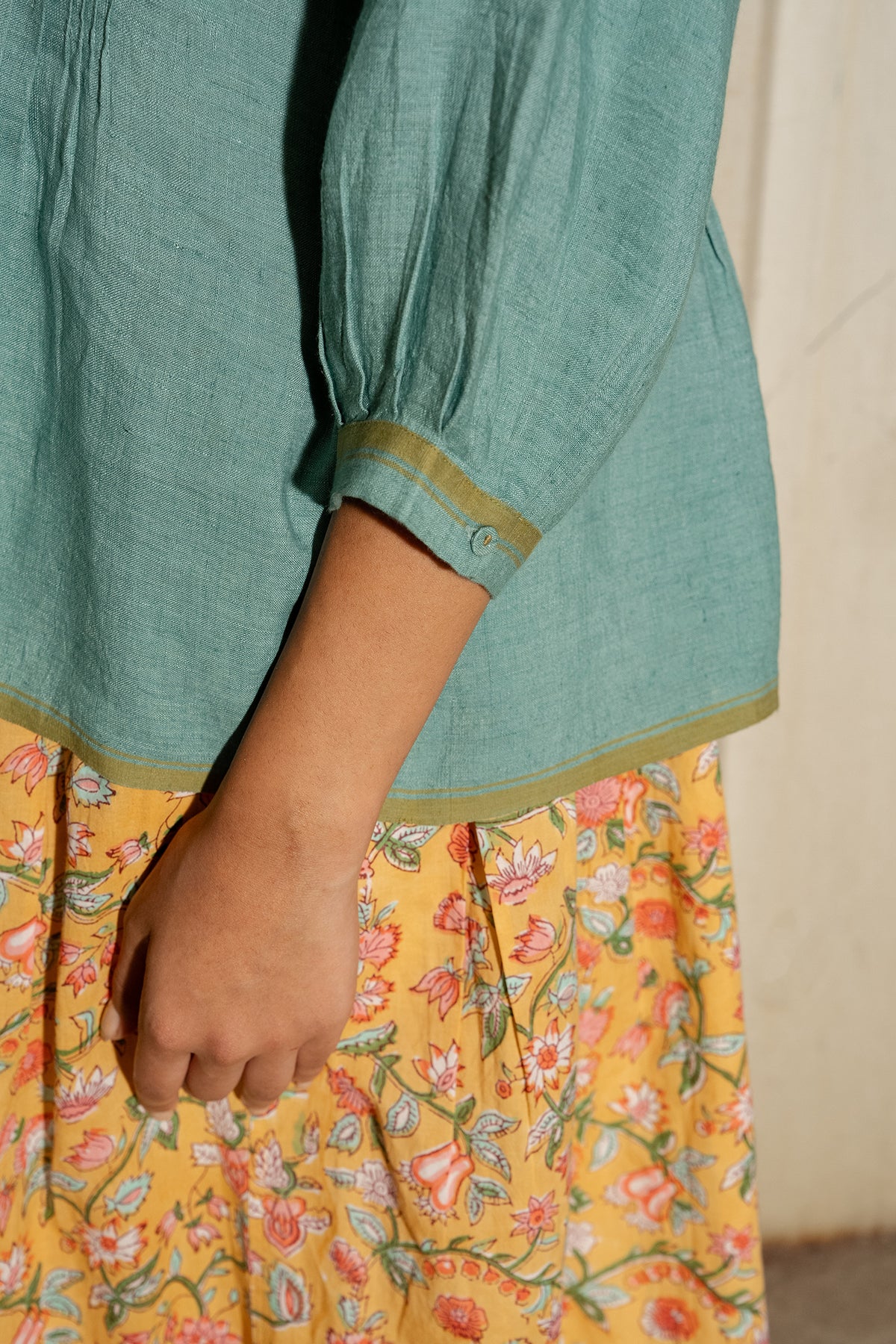 Dve Soma handloom linen pintuck 3/4 sleeve blouse in mineral green.
