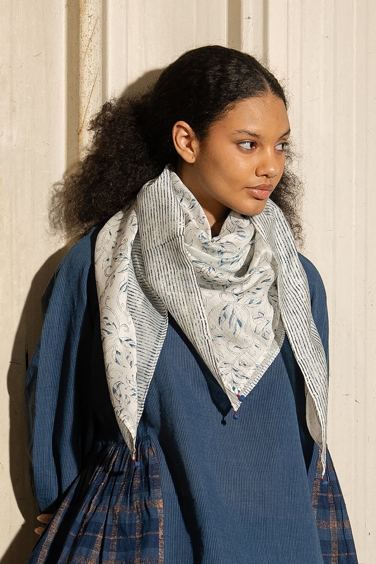 Dve cotton silk blockprinted square scarf with indigo floral and strip print on ecru base.