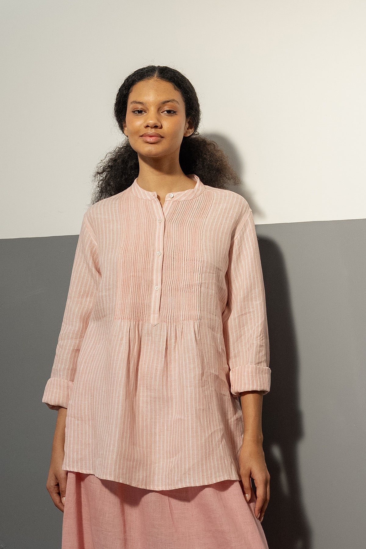 DVE Mohini rose pink stripe linen half button up long sleeve shirt with pintucked bodice.