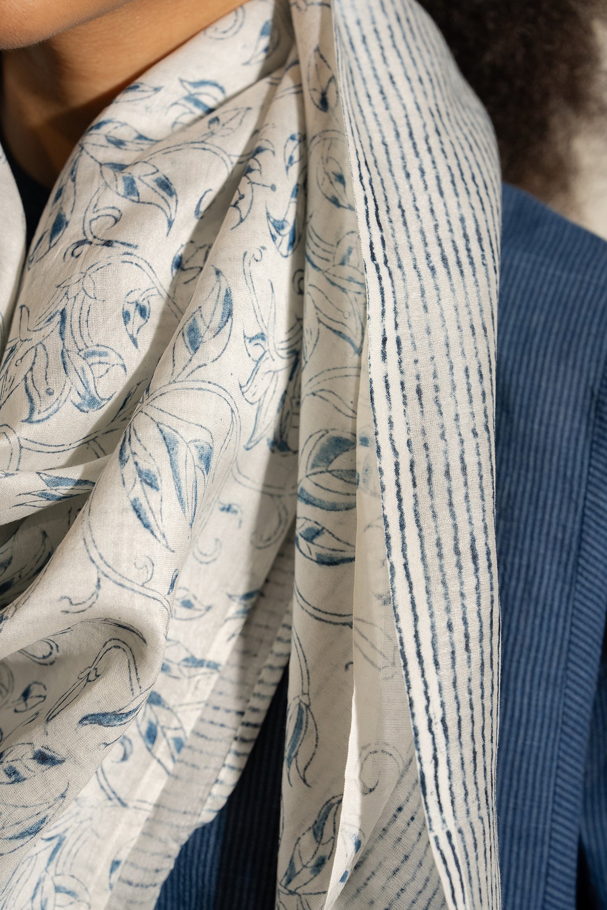 Dve cotton silk blockprinted square scarf with indigo floral and strip print on ecru base.