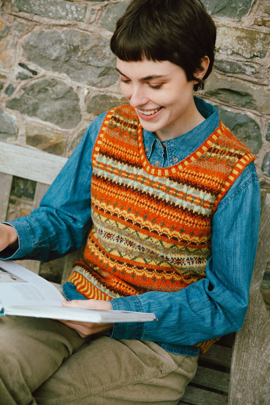 Eribe Shetland wool Westray fairisle vest in orange, taupe and soft yellow.