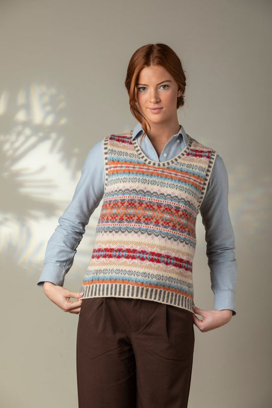 Eribe Westray fairisle vest in Mallaig, ecru, orange, crimson and sky blue.