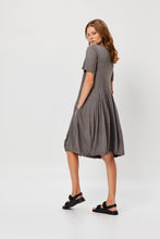 Load image into Gallery viewer, Valia made in Melbourne cotton knit Tilly dress with flared panelled skirt, side pockets, in mushroom taupe.