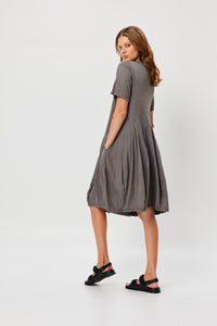 Valia made in Melbourne cotton knit Tilly dress with flared panelled skirt, side pockets, in mushroom taupe.