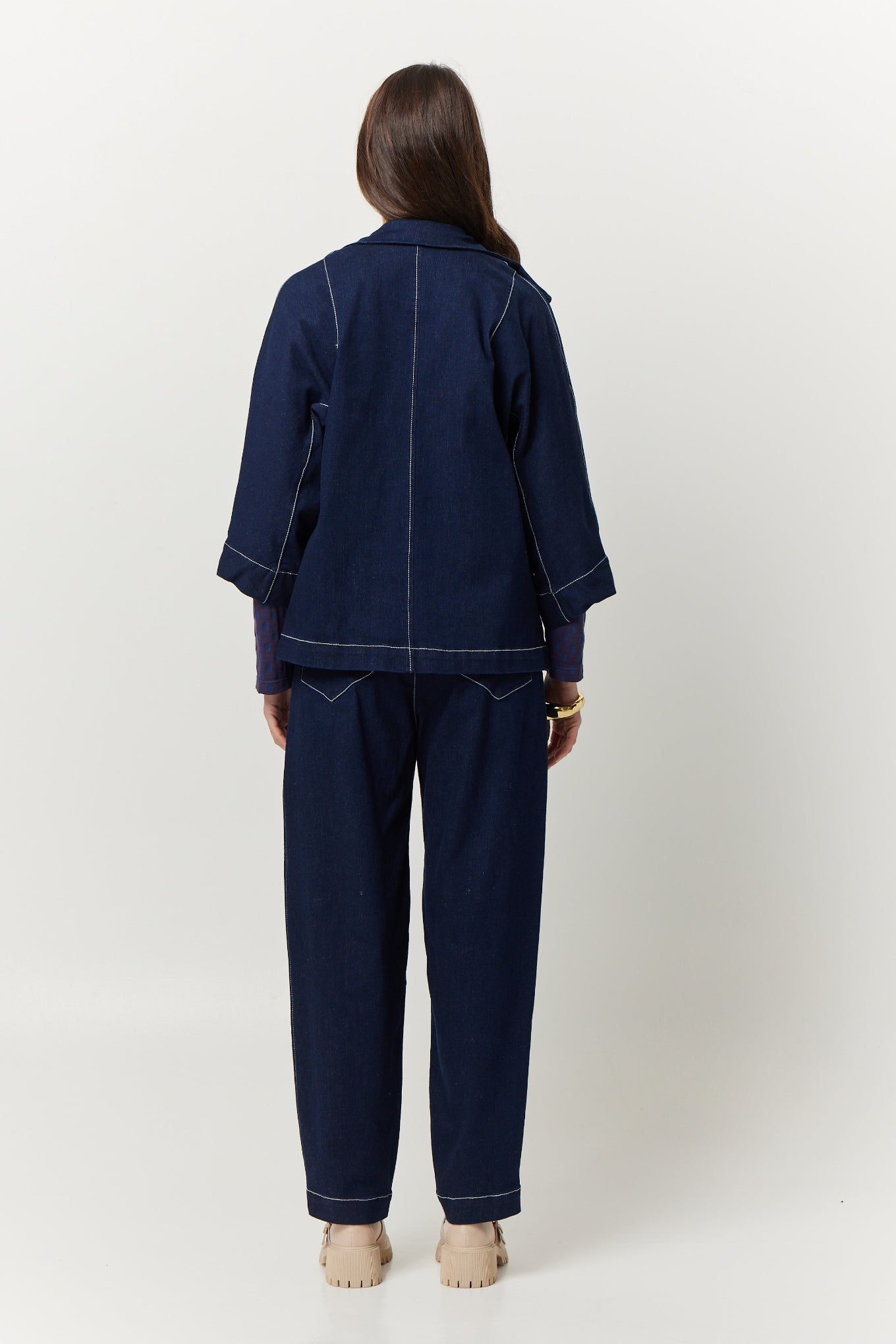 Valia Miro jacket in deep denim blue, feature top stitching.