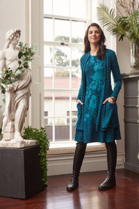 Valia Dixie dress in double weight wool jacquard floral print with spot border Brittany teal turquoise.