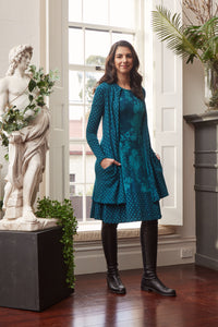 Valia Dixie dress in double weight wool jacquard floral print with spot border Brittany teal turquoise.