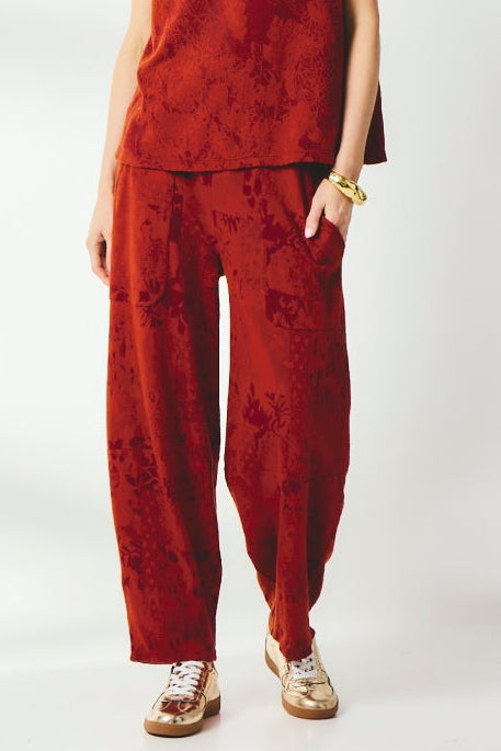 Valia travel pant pull on wool jersey knit in jacquard print Oxblood red.
