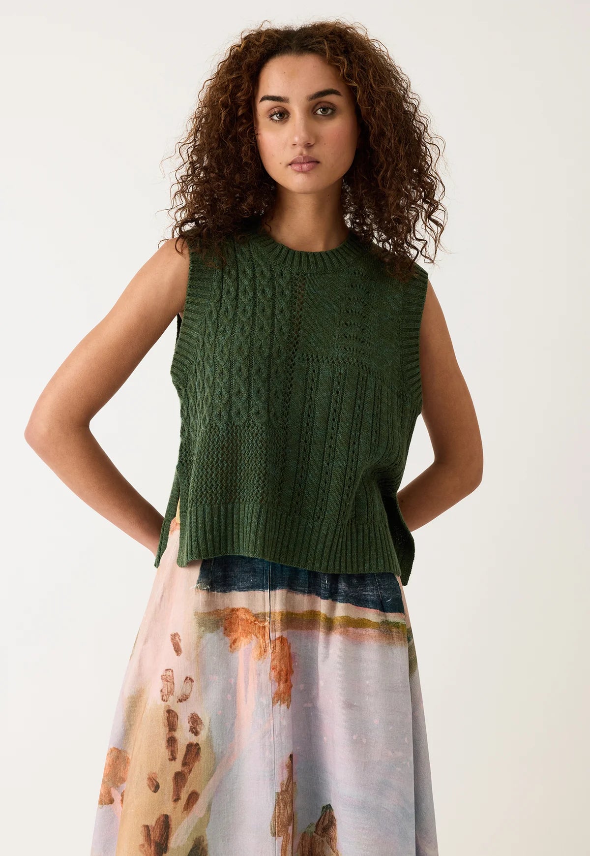 Nancybird cypress green cable knit merino wool vest.