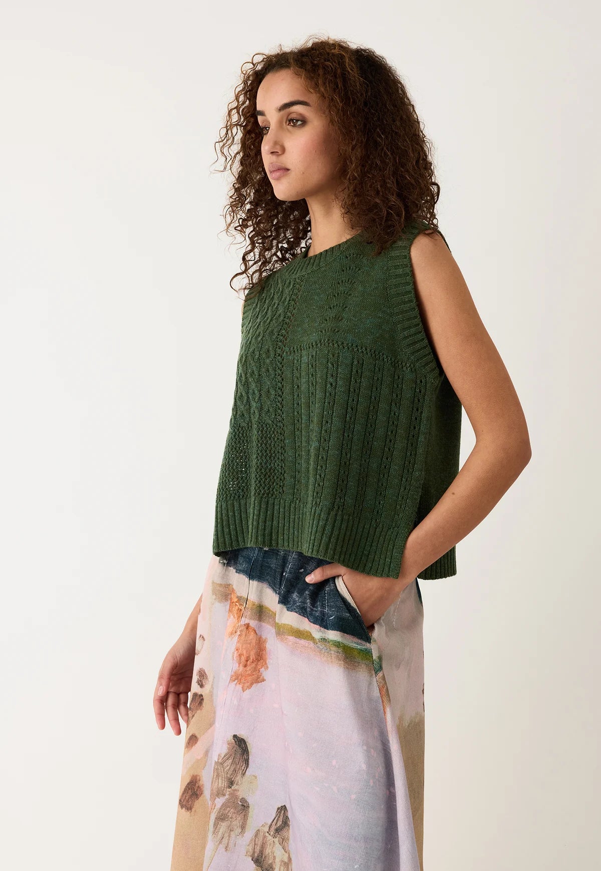 Nancybird cypress green cable knit merino wool vest.
