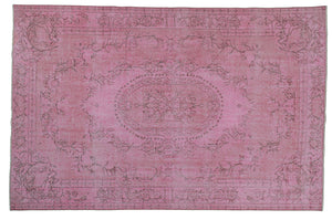 Vintage Turkish carpet floor rug distressed overdyed rose pink.