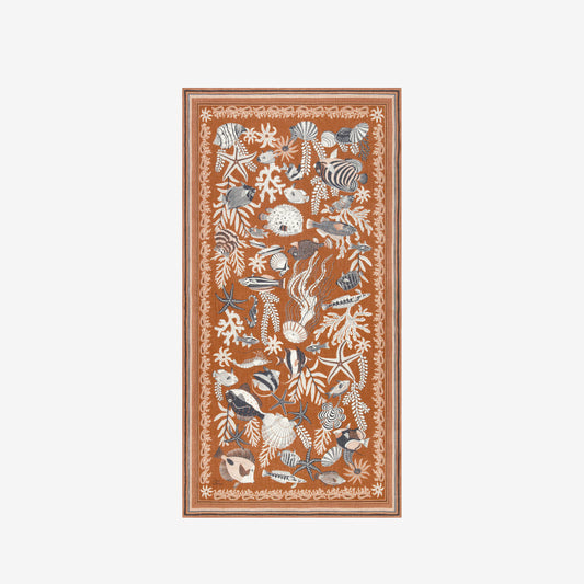 Inoui Editions Neptune Golden brown pure cotton scarf tan background with fish and underwater creatures.