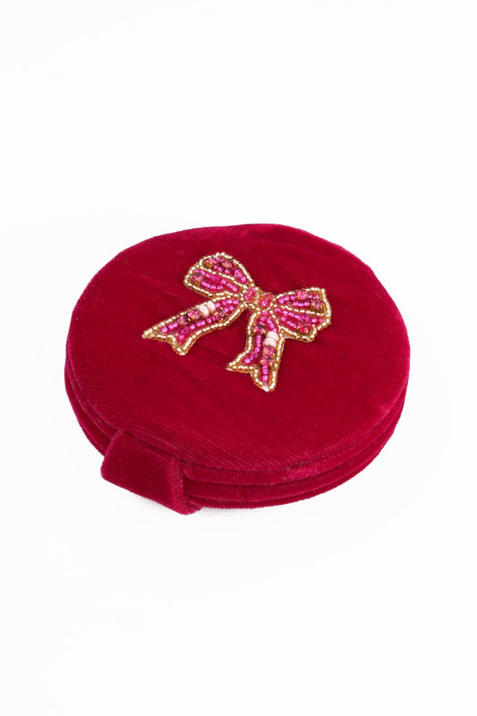 My Doris pink bow velvet compact mirror.