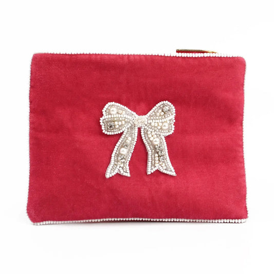 My Doris pink velvet zippered beaded bow pouch.