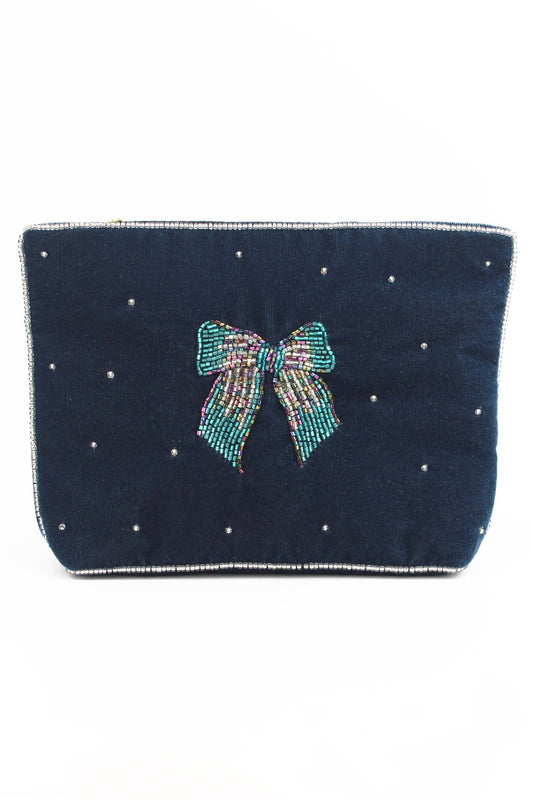 My Doris navy blue clutch pouch with a decorative bow and bead embellishments.
