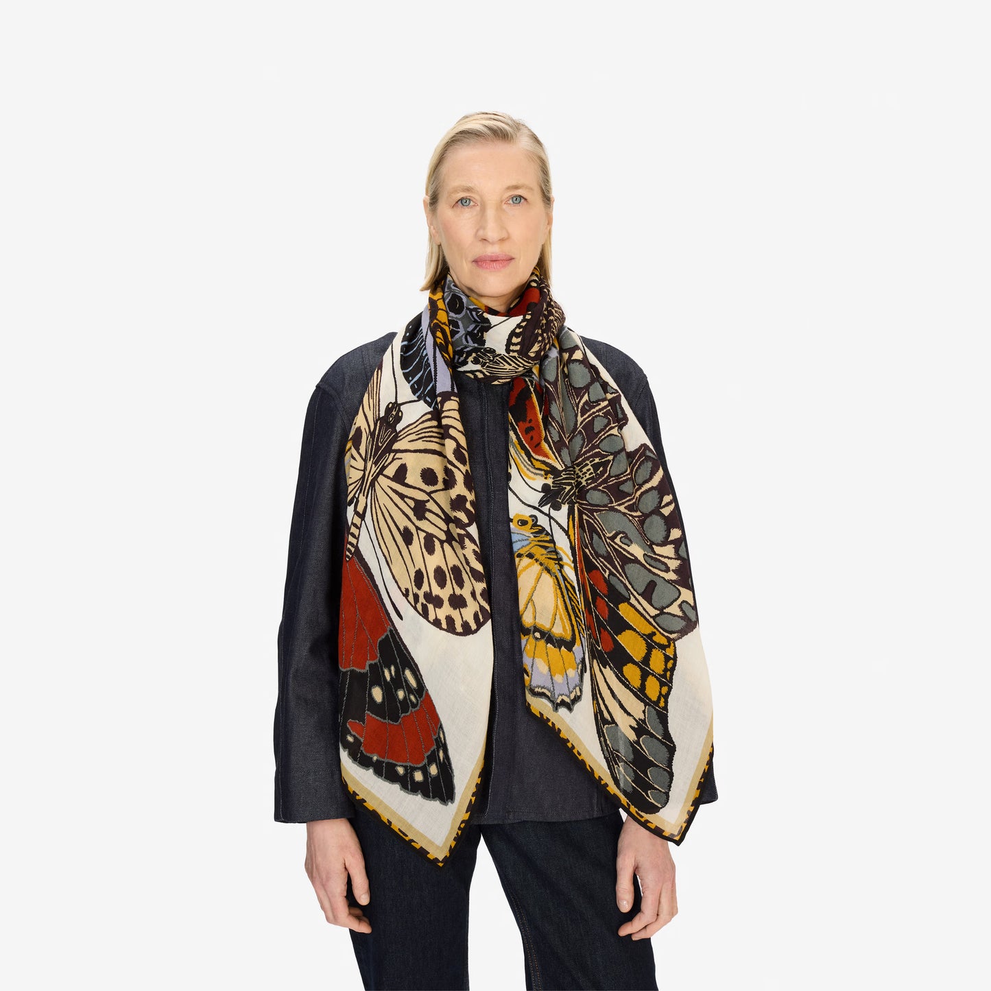 Inoui Editions fine wool scarf Papillons featuring colorful butterfly illustrations on a white background.