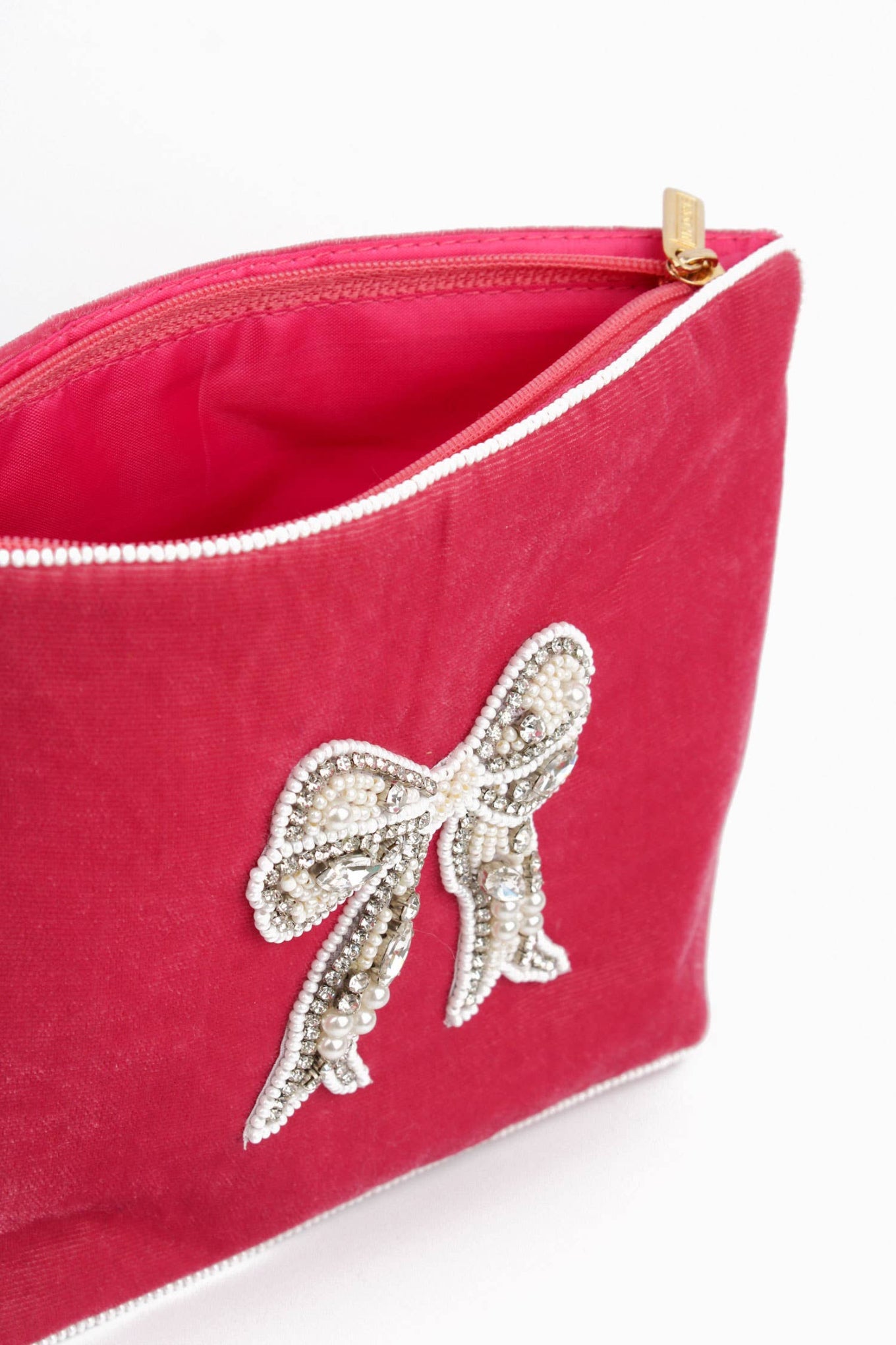 My Doris pearl bow medium sized velvet pouch.