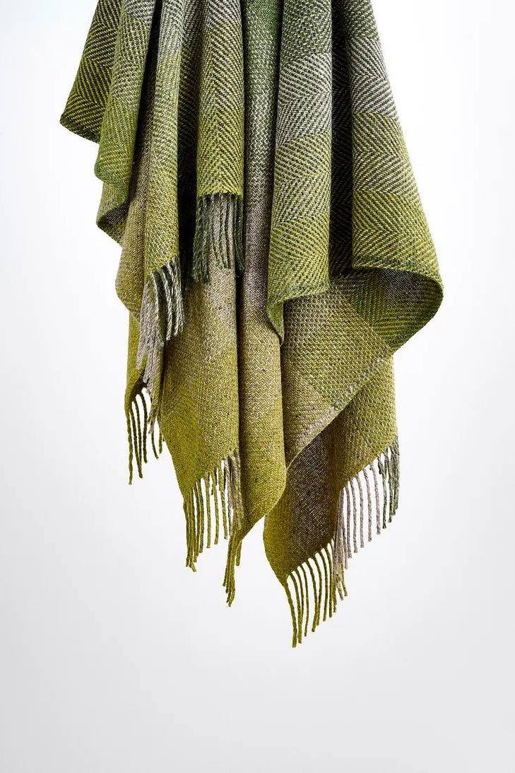 Avoca Century Donegal mohair tweed wool throw in green and beige check.