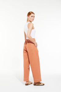 Ma Poesie Victor dune pants in terracotta cotton twill.