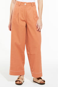 Ma Poesie Victor dune pants in terracotta cotton twill.