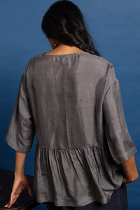 Dve Collection Miraya handloom wrap top in charcoal silk.