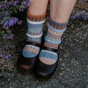 Foxtail Crew Socks are the perfect combination of warm-feeling on the inside and cool-toned on the outside. Colors in this sock: Sky Blue, Light Gray, Dark Gray, Light Brown.